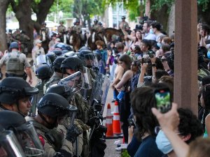 Police lines and protestors meet at the University of Texas Austin campus
