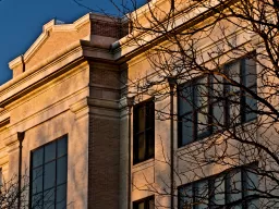 Old Main Graduate School Building facade at sunset