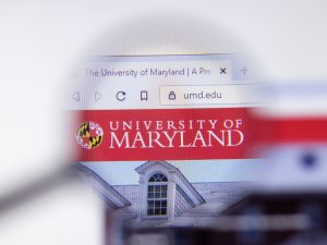 University of Maryland, College Park website homepage logo visible on computer screen