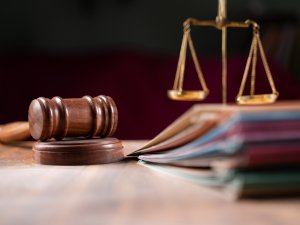 gavel and scales of justice on a table