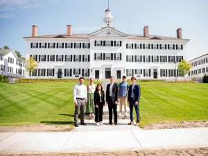 Student leaders of the Dartmouth Political Union pose for a photo in front of Dartmouth Hall