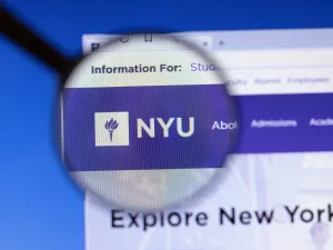 New York University NYU website homepage logo visible on display screen