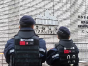 Hong Kong.Police officers stand guard outside a courthouse ahead of a hearing for former media mogul Jimmy Lai in Hong Kong. 