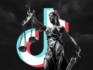 TikTok logo next to a statue of justice