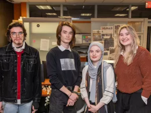 UT Dallas student journalists of The Retrograde newspaper in the office