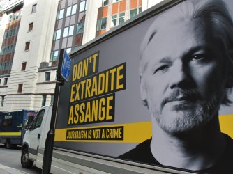 Truck with an image of Julian Assange at his extradition hearing