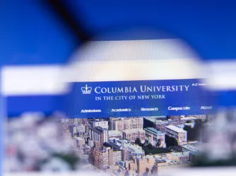 Columbia University website homepage logo visible on display screen