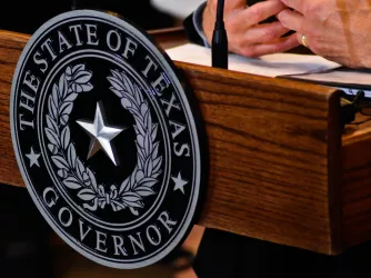 Seal of the State of Texas Governor on a podium