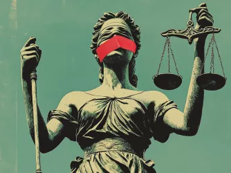 Statue of justice holding scales with red tape over her mouth