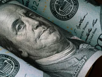 Closeup of Benjamin Franklin face on $100 bill