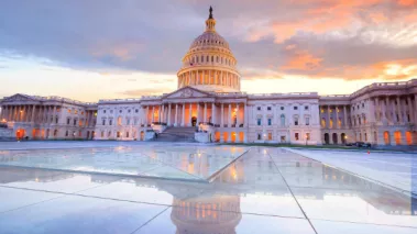 U.S. Capitol Building reflecting pool at sunset