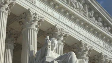 Equal Justice Under Law engraving above entrance to US Supreme Court Building.