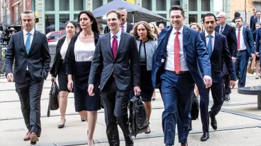 Attorneys for Dominion Voting make their way to the entrance of the Leonard L. Williams Justice Center for day one of the Dominion vs. Fox News trial.