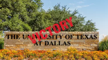 Sunny view of the sign of The University of Texas at Dallas