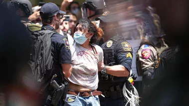 At the University of Texas at Austin on April 29, 2024, police arrest a protester at an encampment where students called attention to the war in Gaza.