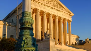 Supreme Court building at dusk