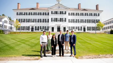 Student leaders of the Dartmouth Political Union pose for a photo in front of Dartmouth Hall