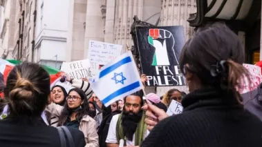 Pro-Israeli and pro-Palestinian protesters gather in front of the CUNY grad center in New York city.