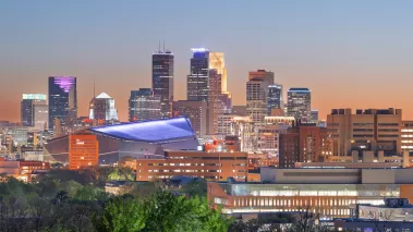 Minneapolis, Minnesota, downtown city skyline at dusk.