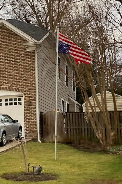 American flag upside down ourside home of Samuel Alito