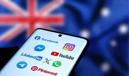 Smart phone showing social media icons with the flag of Australia in the background