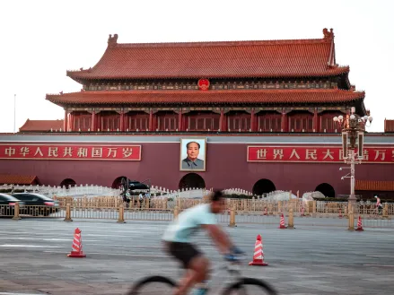 Famous Tiananmen Square in Beijing, China with view on Forbidden City and Mao Zedong picture at sunset