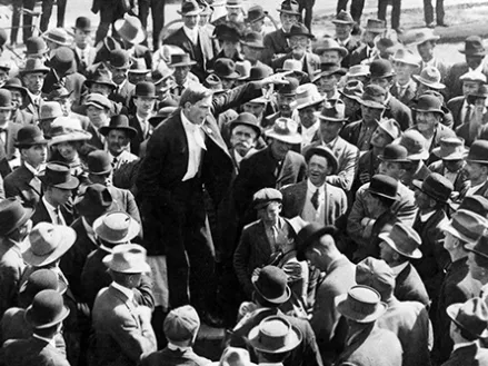 During the winter and spring of 1912, members of the Industrial Workers of the World (IWW) and their allies in labor and the community engaged in a pitched battle against a city ordinance that banned public speaking in the area around 5th and E Streets in downtown San Diego. 