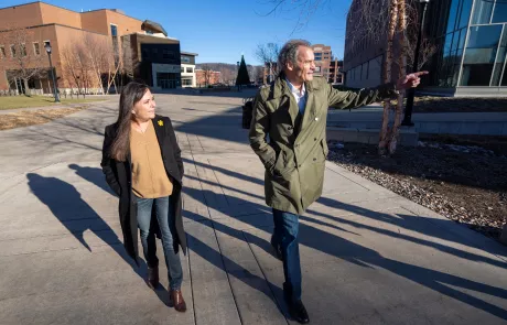 Joe Gow and wife Carmen Wilson walk across campus December 29 2023 at UW-La Crosse