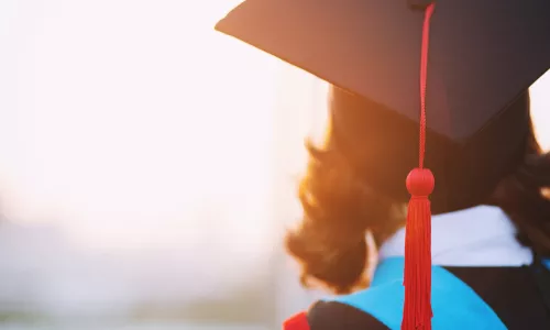 shot of graduation hats during commencement