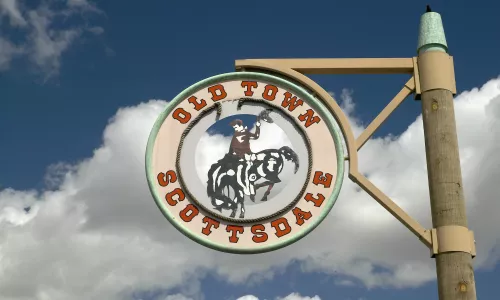 A circular sign showing Old Town in Scottsdale, Arizona