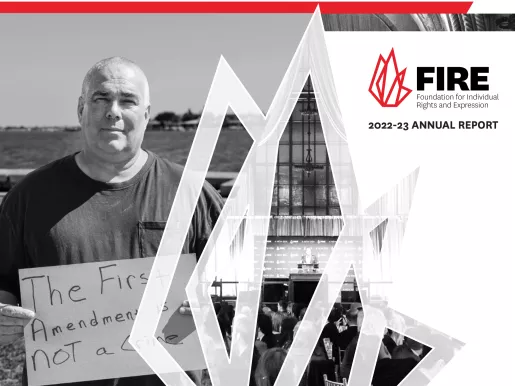 Cover of FIRE's 2022-23 annual report featuring army veteran Jeff Gray holding a sign that reads "The First Amendment is not a crime"