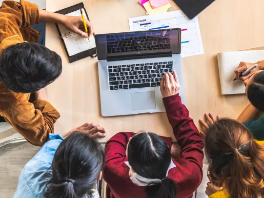 Students working around a table